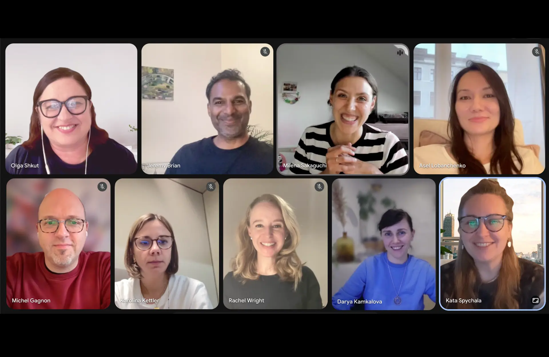 Video call with nine participants in a grid, each named beneath their tile, including Kata Spychala.