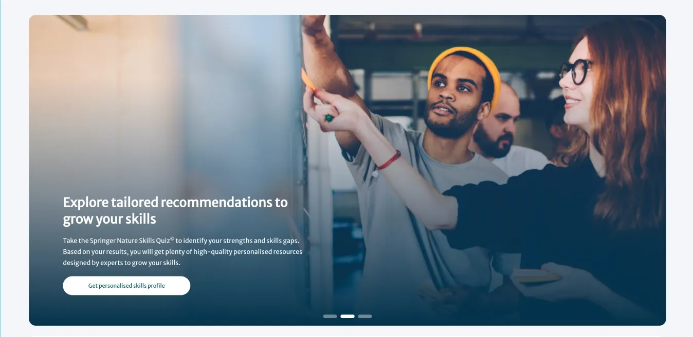 Website prototype hero: three colleagues in an office beside the heading 'Explore tailored recommendations to grow your skills'.